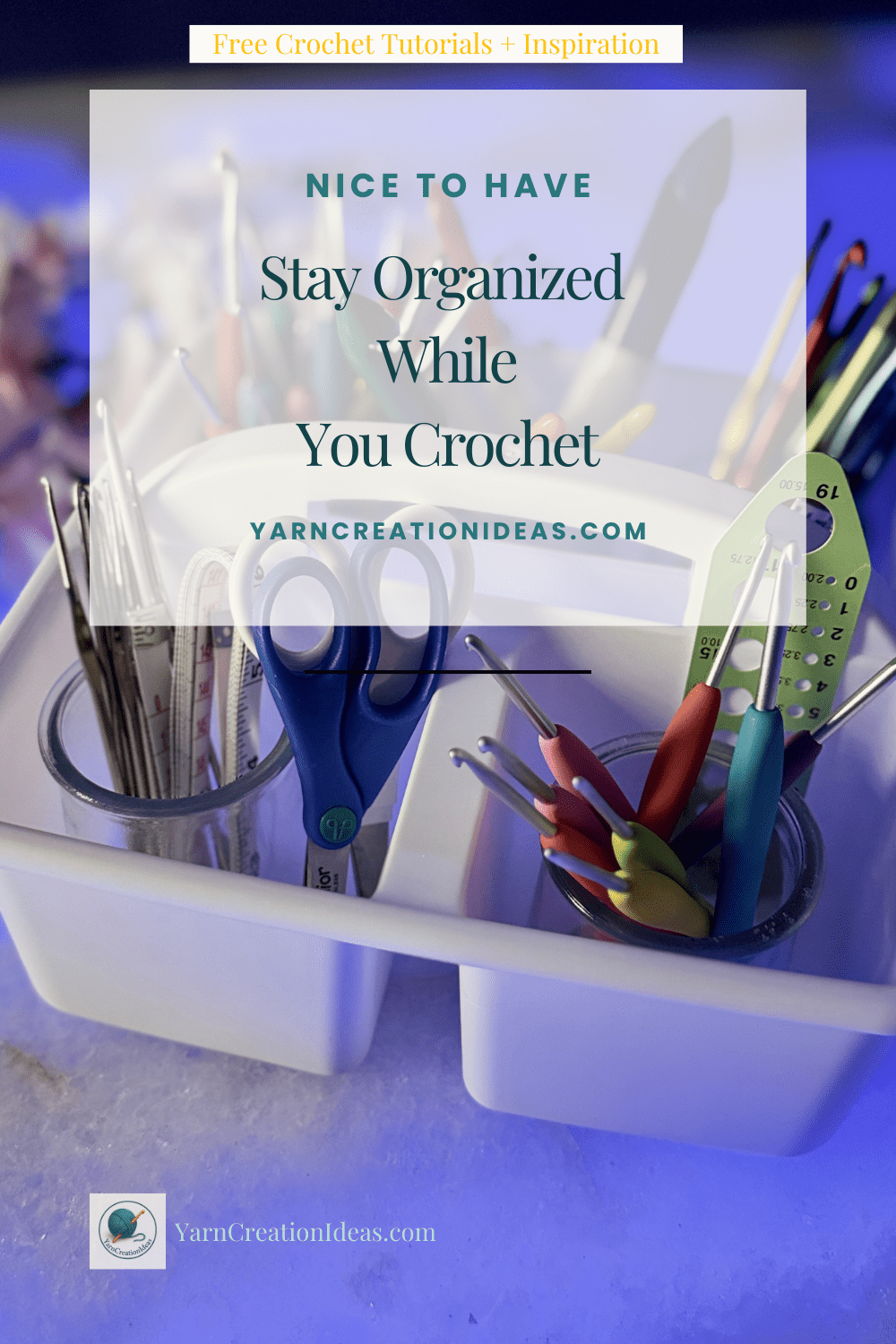 Plastic white caddy with organized crochet supplies like ergonomic hooks, scissors, gauge rulers, and tapestry needles, styled on a blue background.