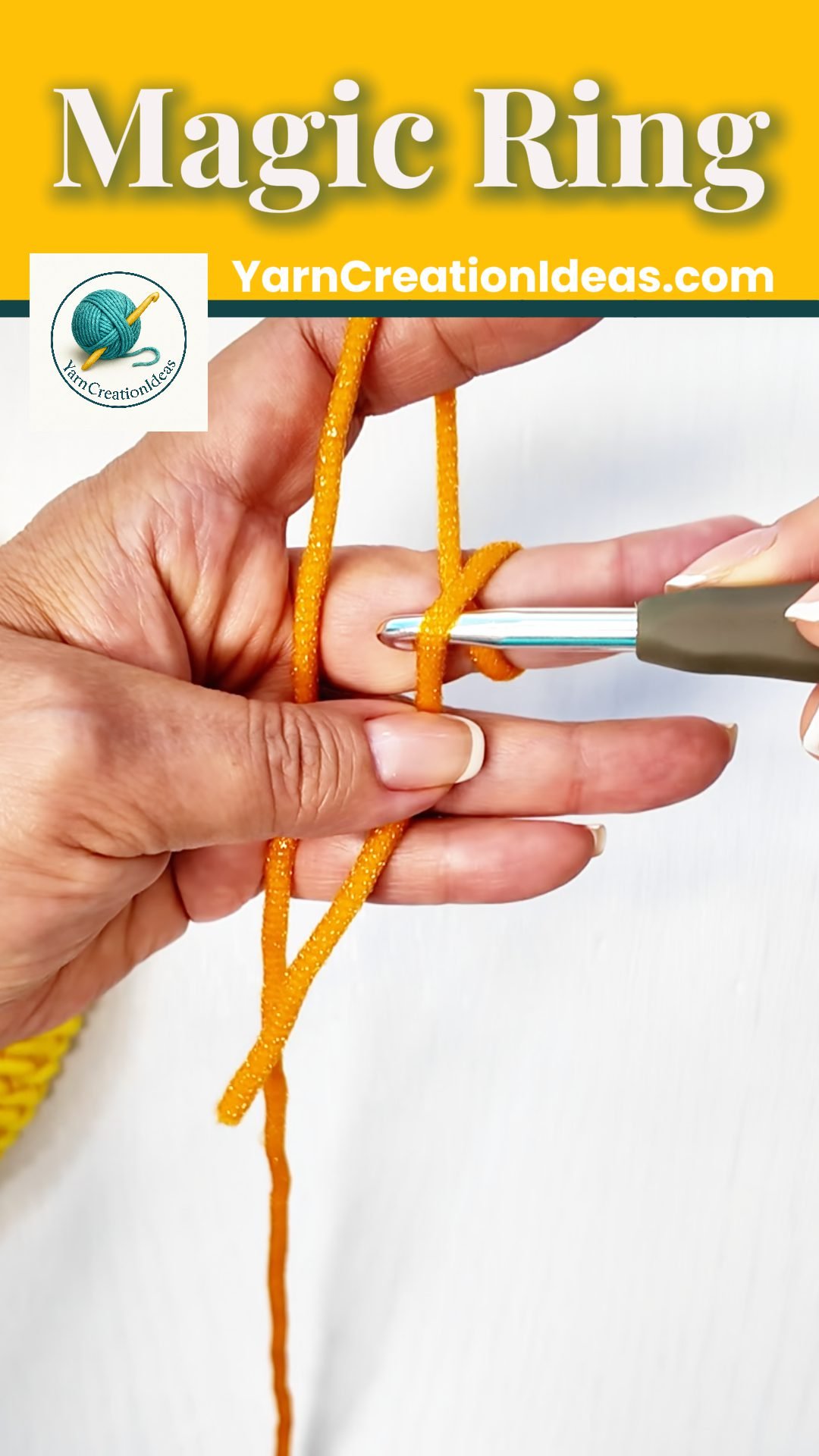 Hook inserted under the front loop of the yarn X to begin a magic ring