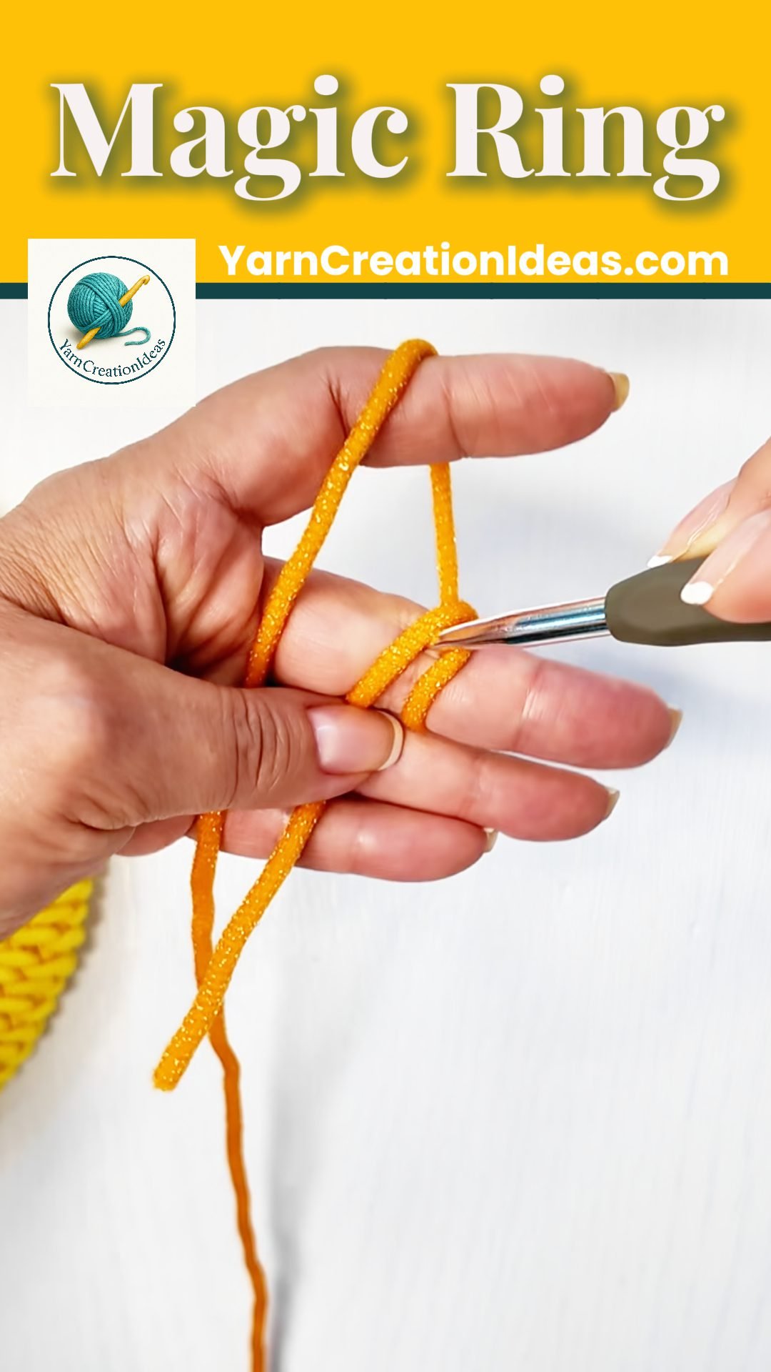 Hook inserted under the front loop of the yarn X to begin a magic ring.