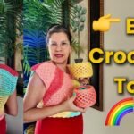 Woman wearing a handmade easy crochet top in rainbow gradient yarn, shown from front and back. Beginner-friendly crochet blouse tutorial with free pattern and charts.